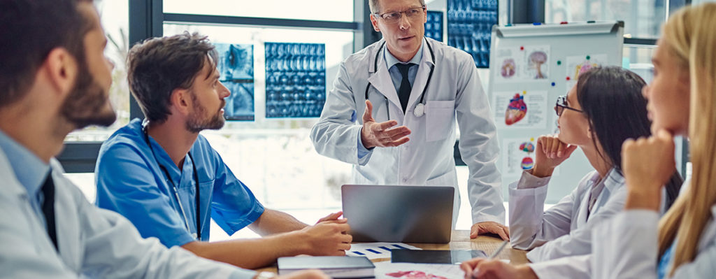 Group Of Doctors In Clinic - Minotto Contabilidade